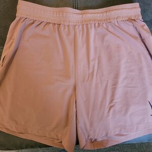 Nike Dri-FIT Mens Yoga Shorts in Rust